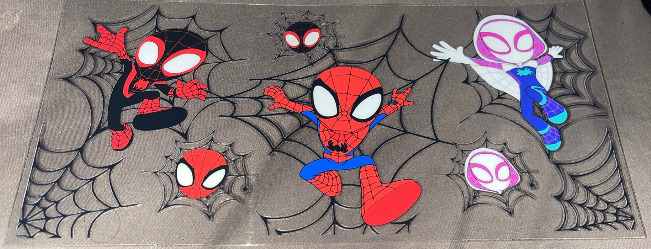 Spider man in web with black and red spider man