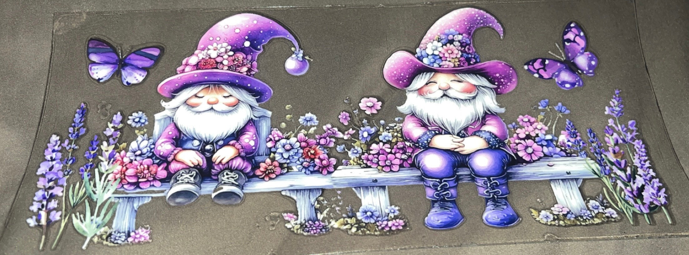 Gnomes sitting on bench