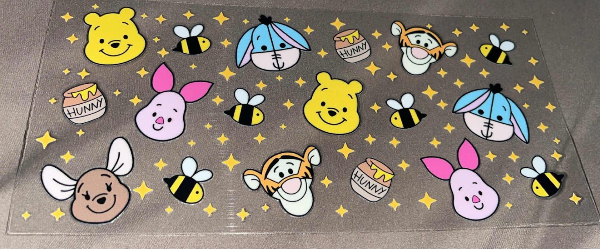 Whinne the Pooh and friends with honey pots and flowers