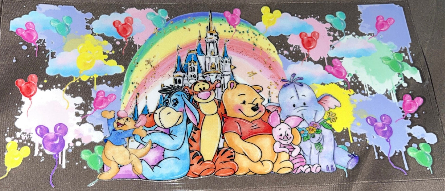 Whinne the Pooh and friends with rainbow and castle