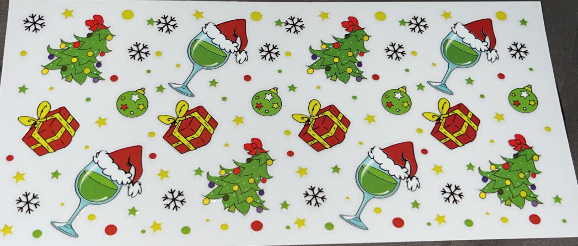 The Grinch with wine glasses and presents